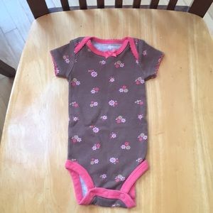Like new! Brown and pink onesie